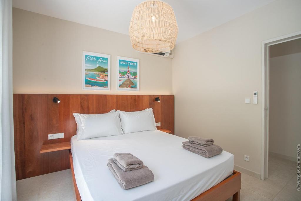 Letto o letti in una camera di Villa Mahogany