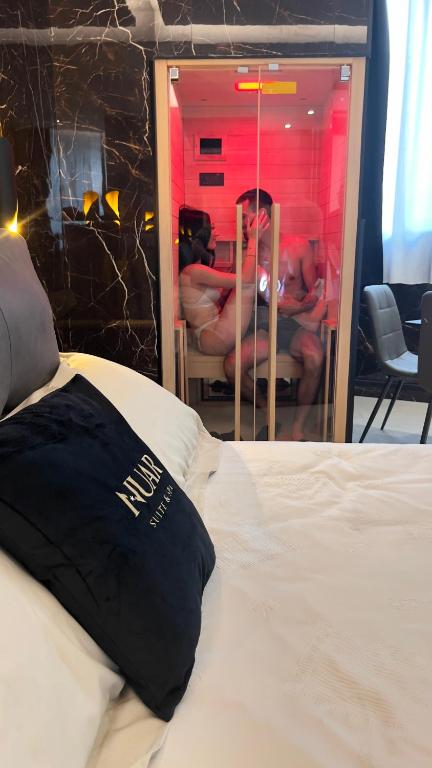 Posteľ alebo postele v izbe v ubytovaní Nuar suite&spa
