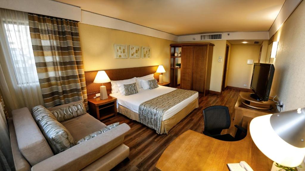 Cama ou camas em um quarto em Blue Tree Towers Caxias do Sul