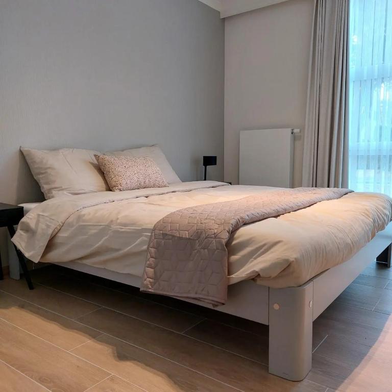 Postel nebo postele na pokoji v ubytování Vakantiewoning De Papendaler