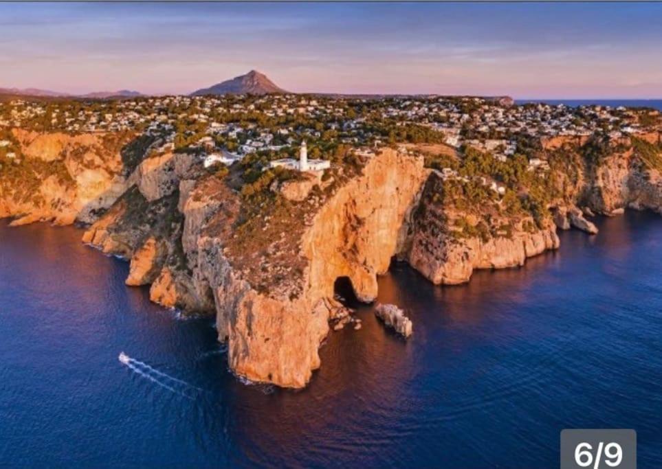 an aerial view of a rocky island in the water at Casa Halcón in Jávea