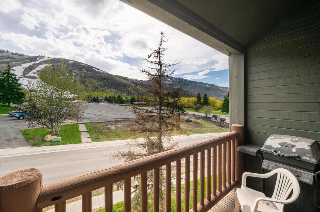 a balcony with a view of a mountain at Powder Point Condos by Lespri Property Management in Park City