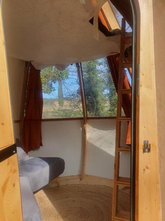 Palanda nebo palandy na pokoji v ubytování nuit étoilée