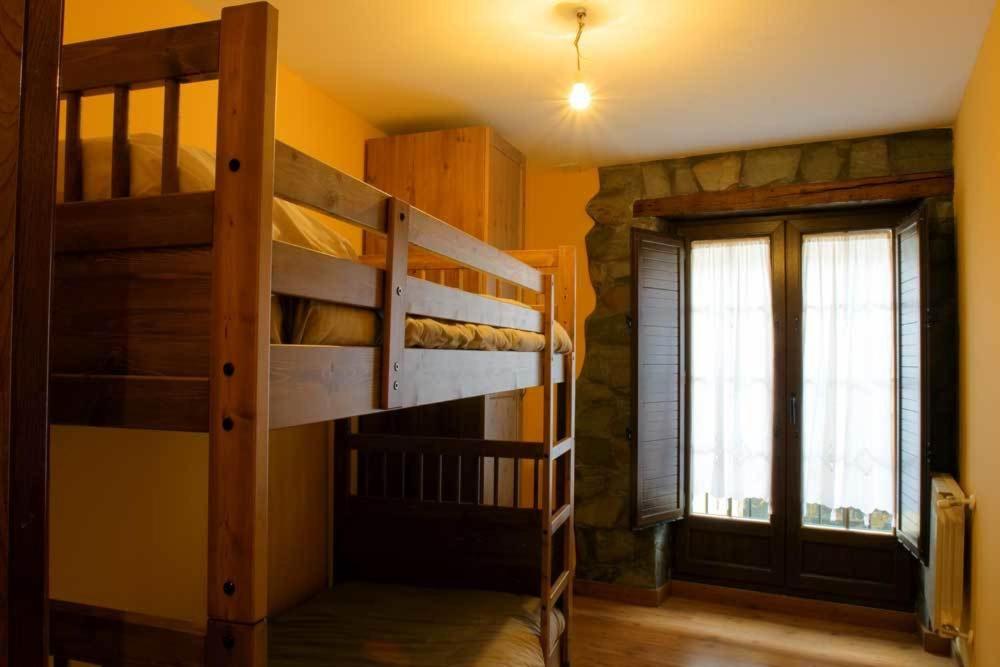 Postel nebo postele na pokoji v ubytování Tía María