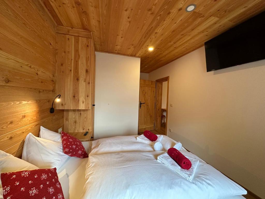 Postel nebo postele na pokoji v ubytování Hotel ŠURC