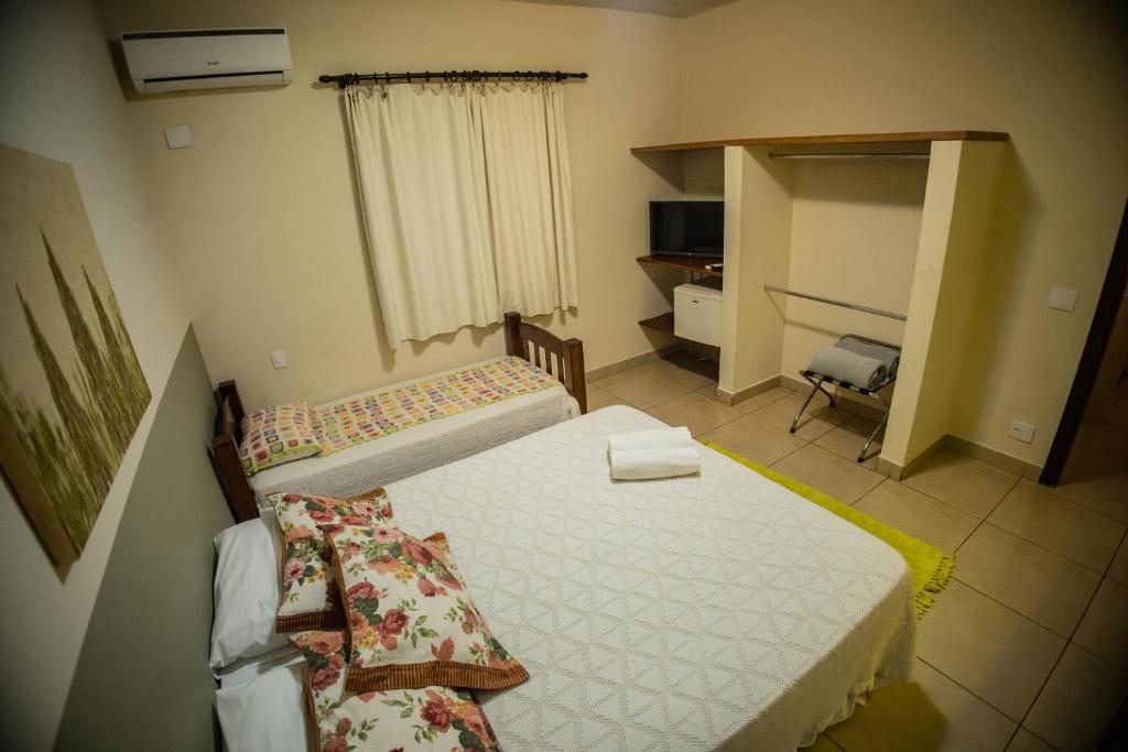 Postel nebo postele na pokoji v ubytování Paineiras Hotel Fazenda