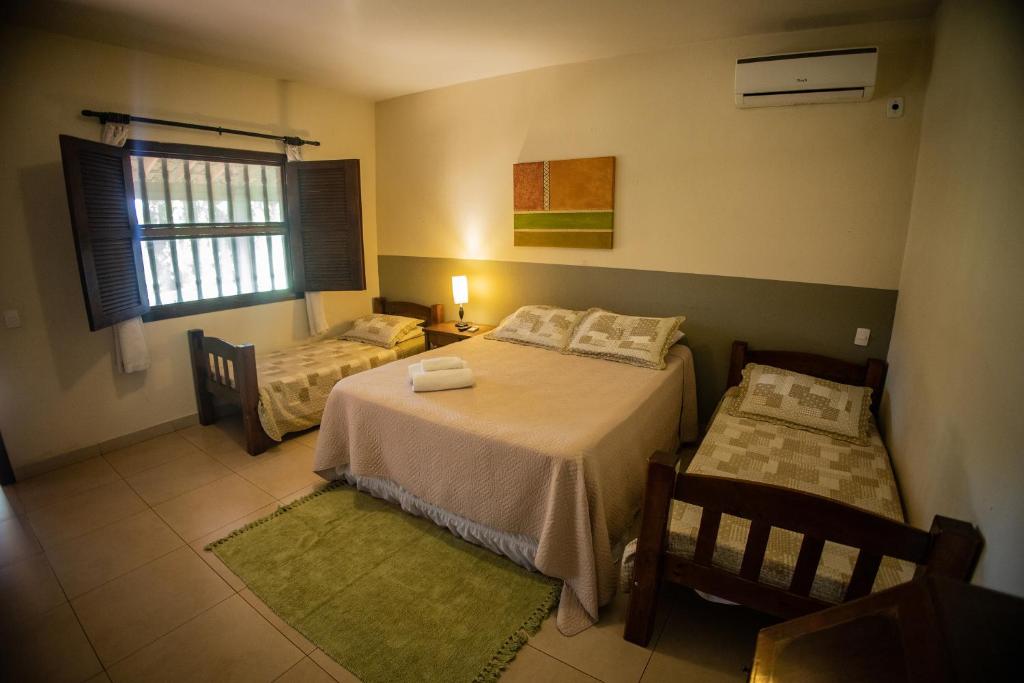Postel nebo postele na pokoji v ubytování Paineiras Hotel Fazenda