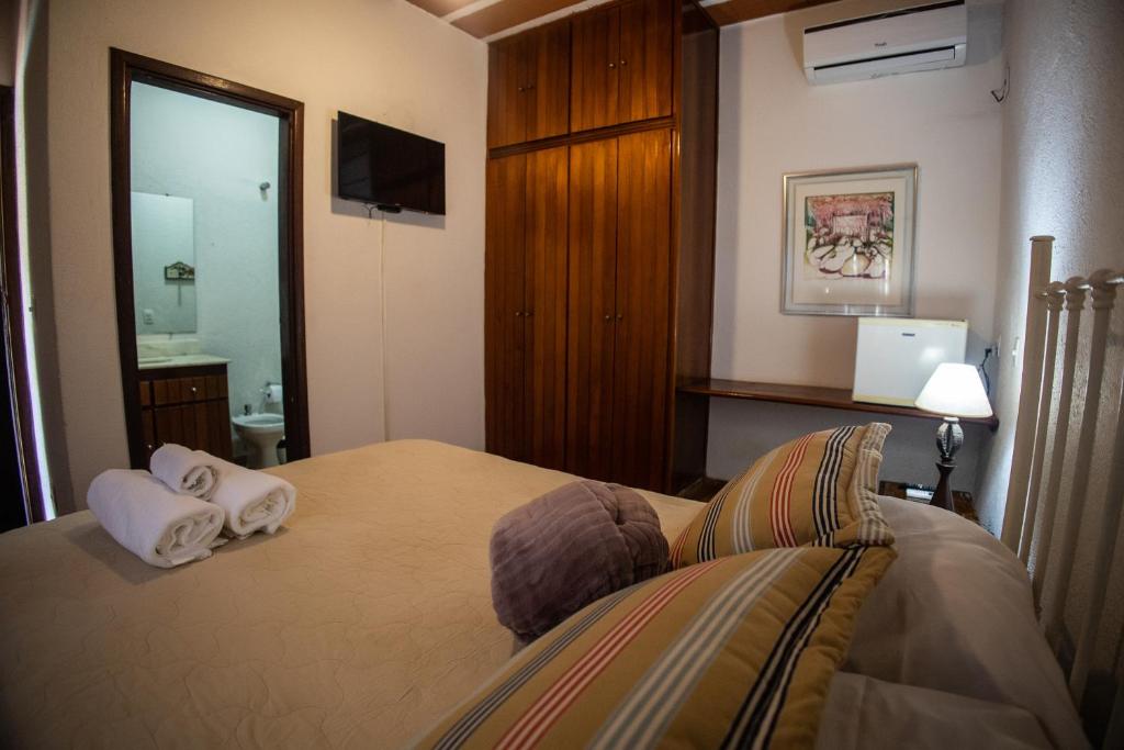 Postel nebo postele na pokoji v ubytování Paineiras Hotel Fazenda