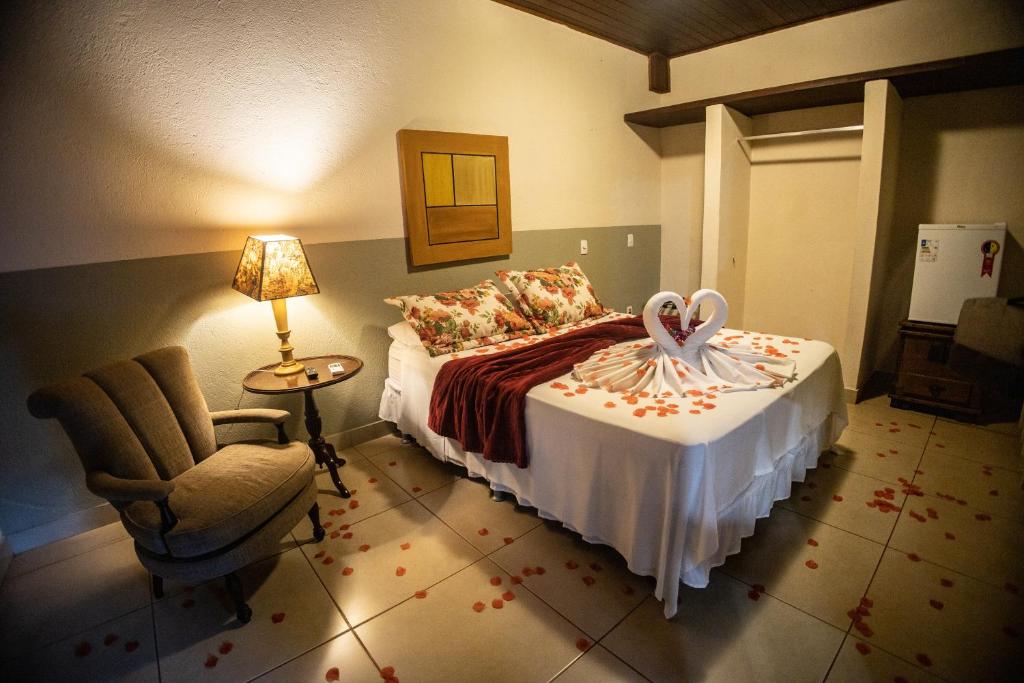 Postel nebo postele na pokoji v ubytování Paineiras Hotel Fazenda