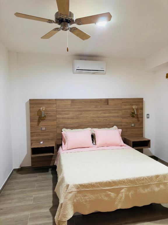 Postel nebo postele na pokoji v ubytování Hotel Paso Realce