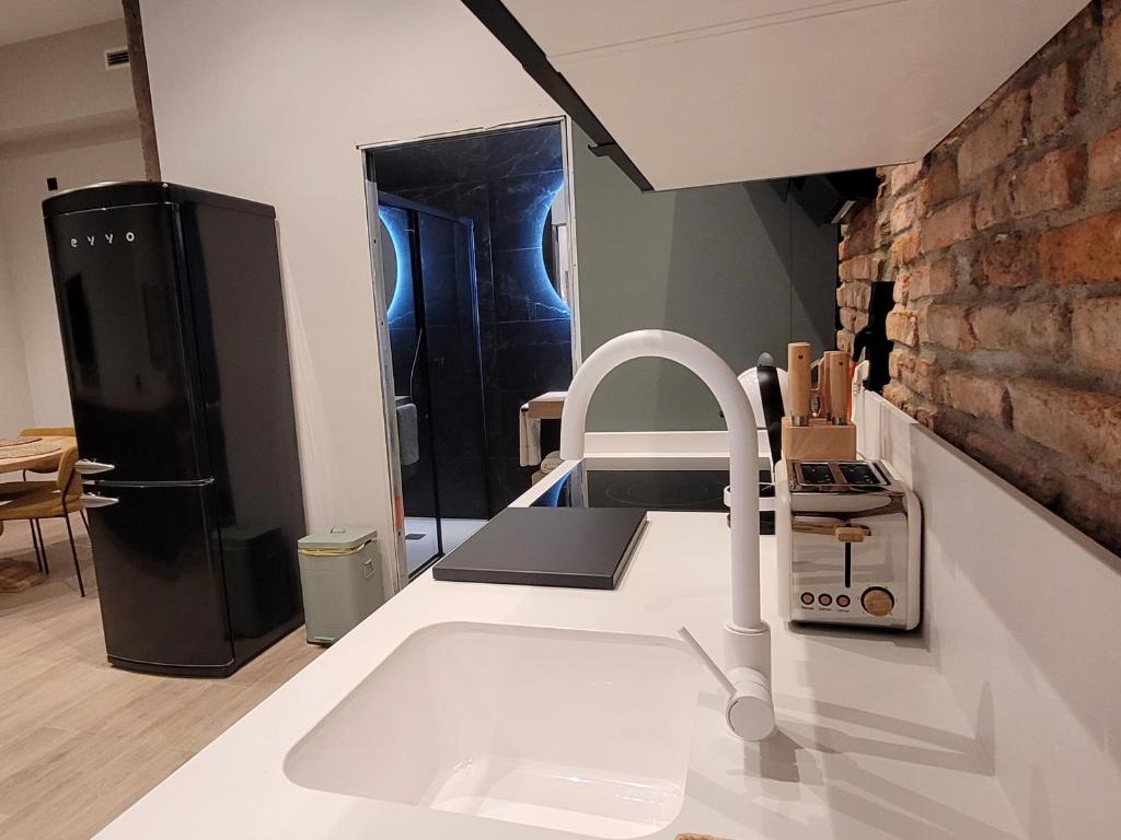 Koupelna v ubytování SUITE HAUS BAHIA