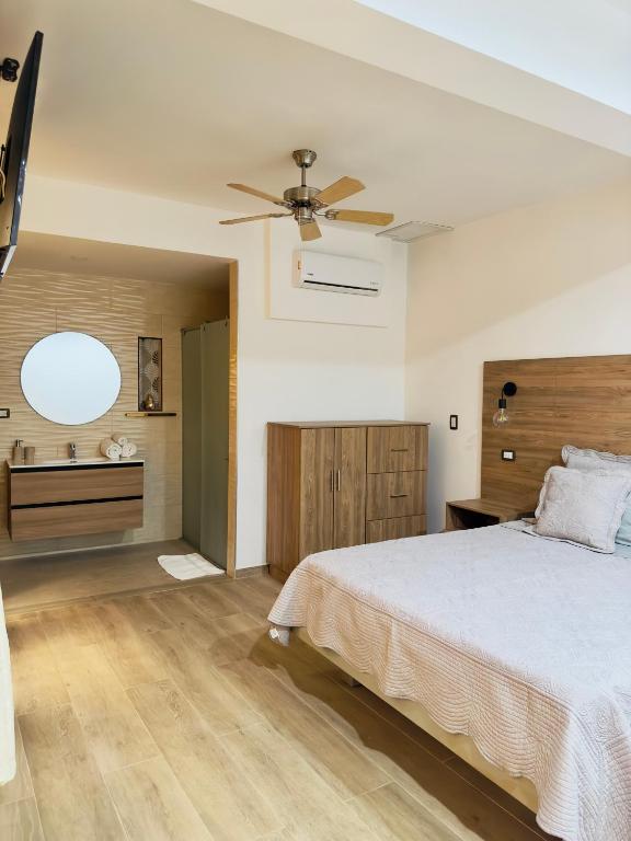 Postel nebo postele na pokoji v ubytování Hotel Paso Realce