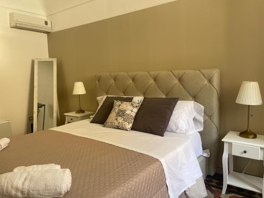 Postel nebo postele na pokoji v ubytování Immacolata Rooms