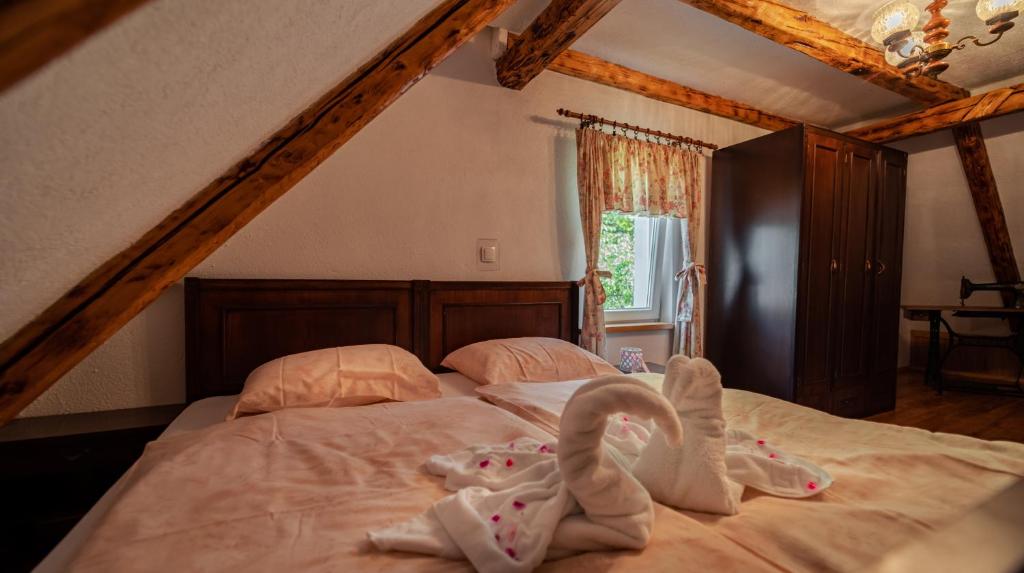 Postel nebo postele na pokoji v ubytování KUĆA ZA ODMOR DANICA