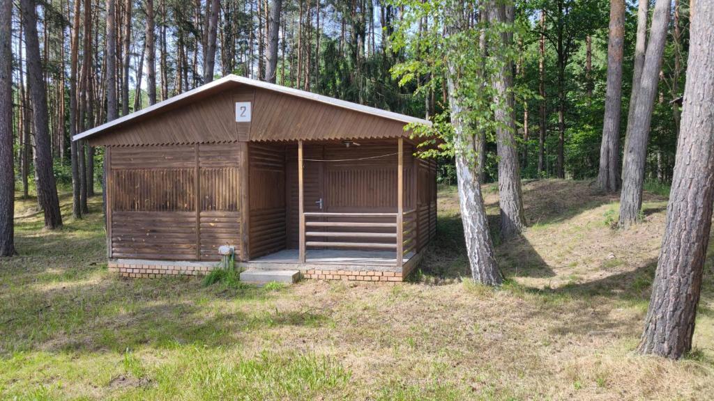 a wooden building in the middle of a forest at Soukeník FCT in Sezimovo Ústí