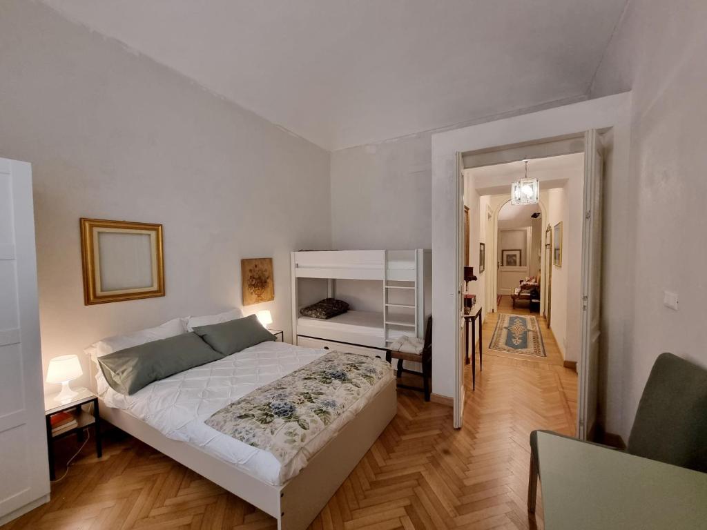 Giường trong phòng chung tại Borgo Po bliss