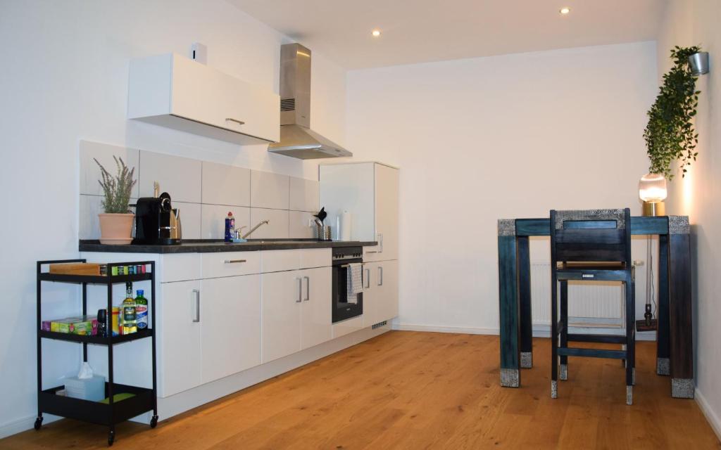Kuchyň nebo kuchyňský kout v ubytování Modernes Studio Appartement mit Leseecke