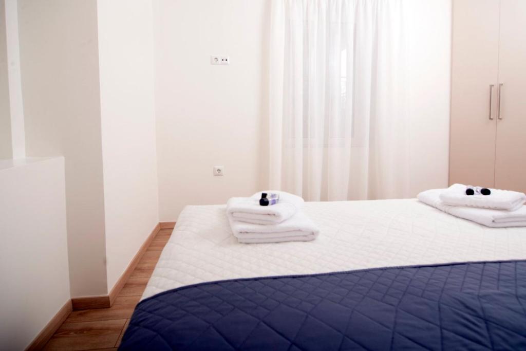 Postel nebo postele na pokoji v ubytování G&K House View