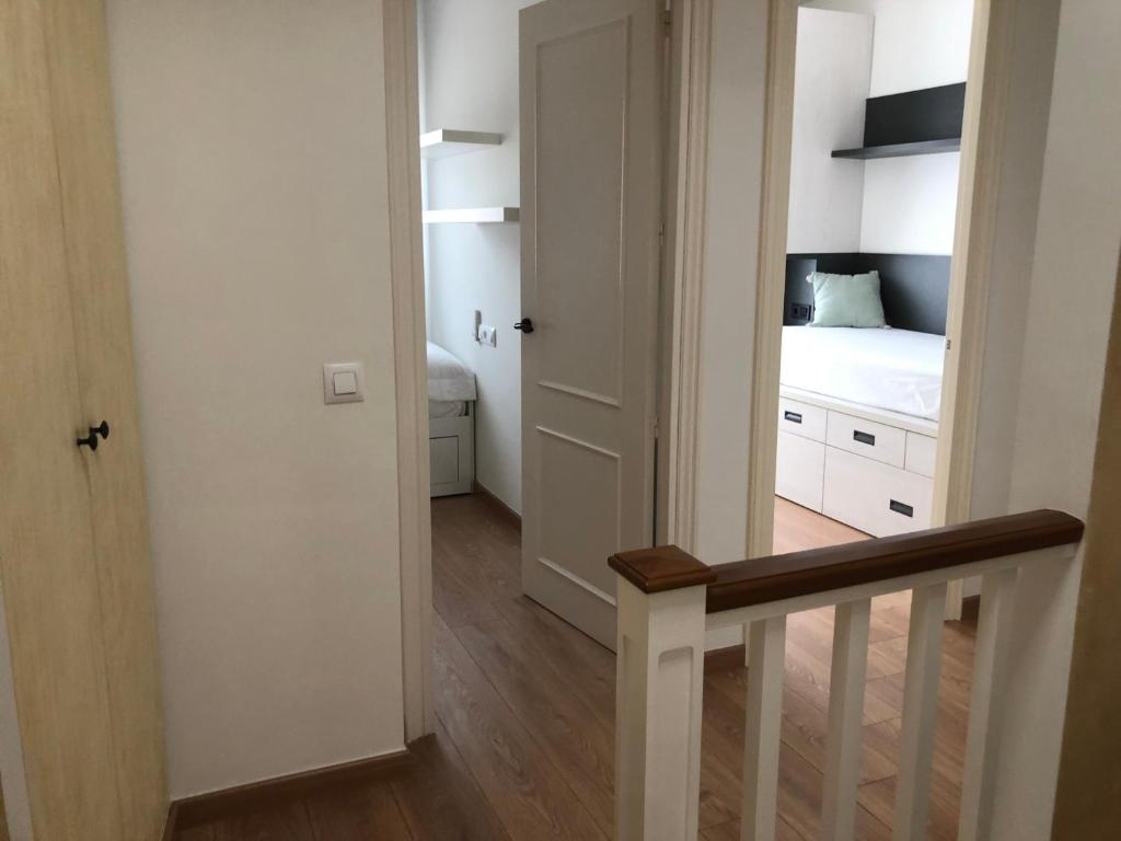 TV a/nebo společenská místnost v ubytování Casita de la playa con parking