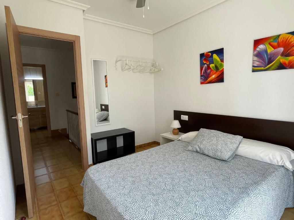Postel nebo postele na pokoji v ubytování VACACIONES CHALET PEÑISCOLA 8-B Alquiler