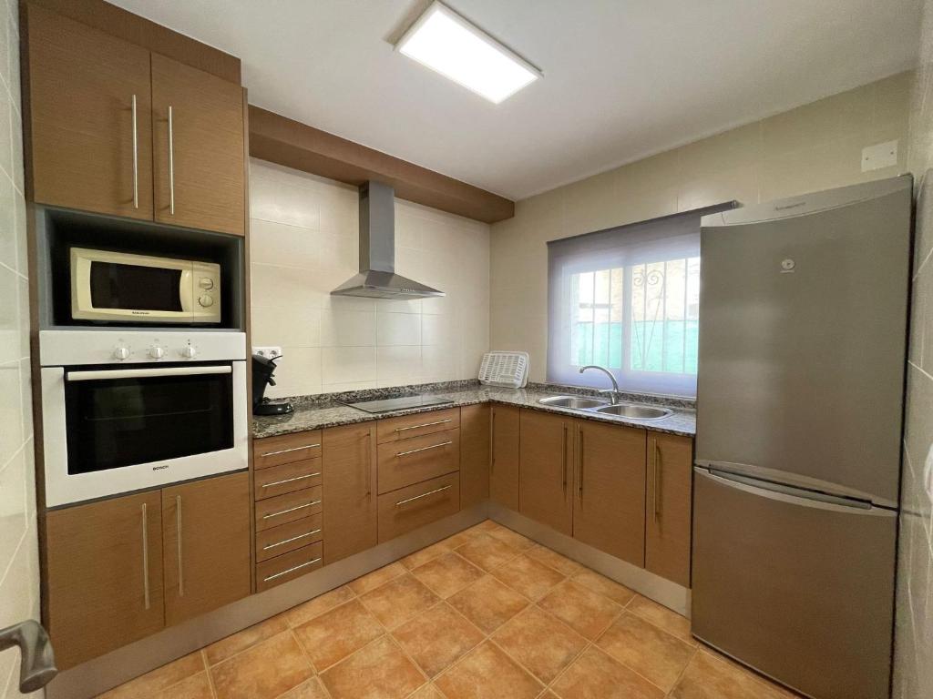 Kuchyň nebo kuchyňský kout v ubytování VACACIONES CHALET PEÑISCOLA 8-B Alquiler