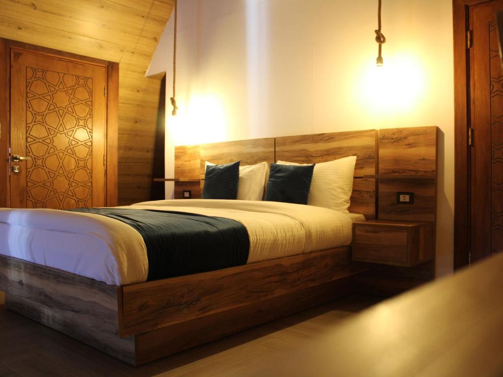 Postel nebo postele na pokoji v ubytování Deadsea OCTAGON