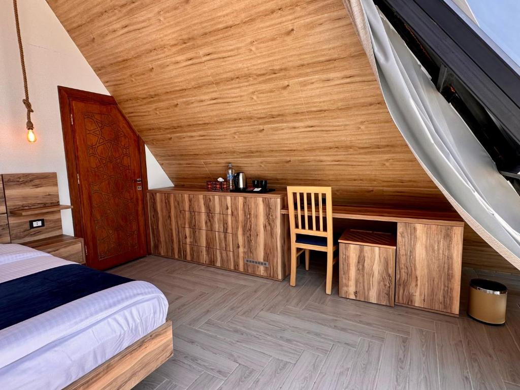 Postel nebo postele na pokoji v ubytování Deadsea OCTAGON