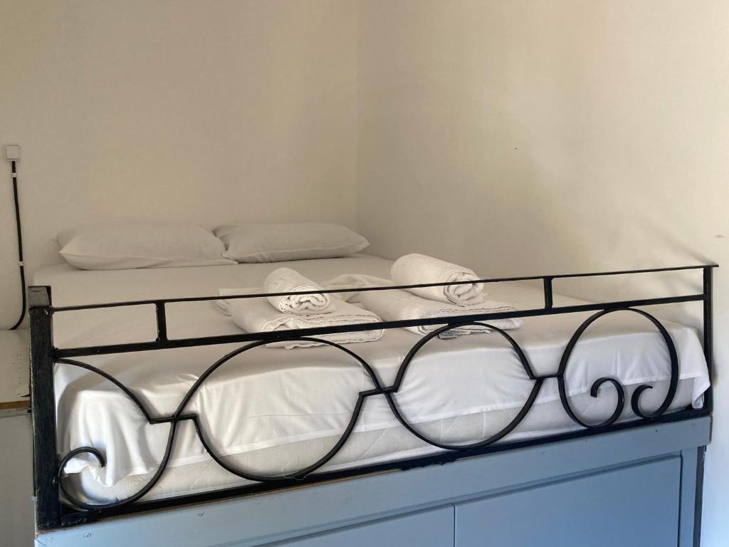 Postel nebo postele na pokoji v ubytování ANEMOS residence