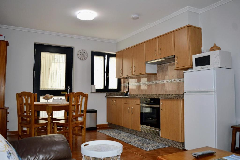 Kuchyň nebo kuchyňský kout v ubytování Apartamento Linde