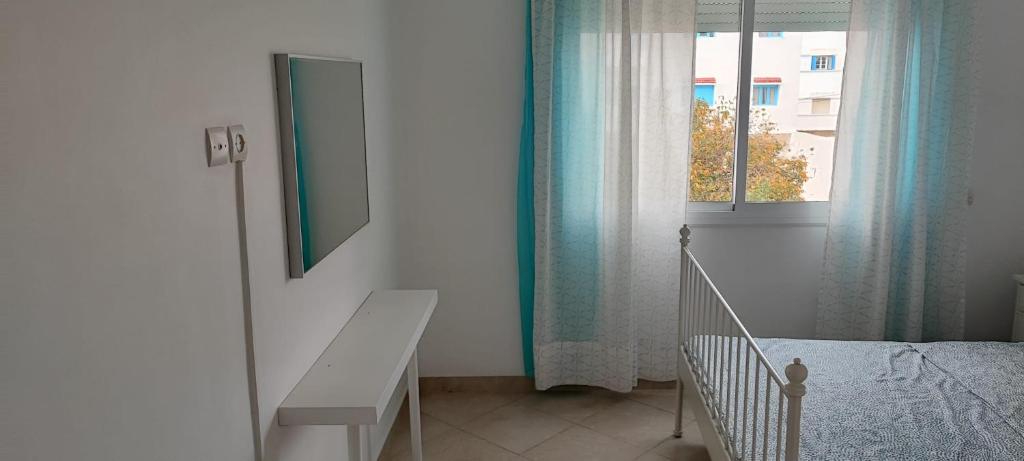 Postel nebo postele na pokoji v ubytování BOUAZIZ