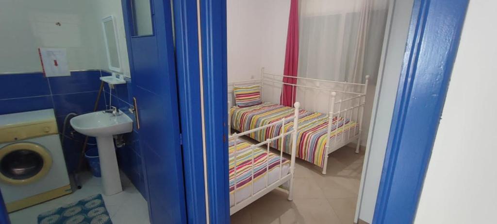 Postel nebo postele na pokoji v ubytování BOUAZIZ