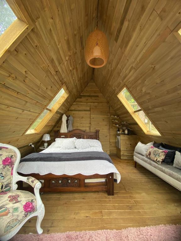 Postel nebo postele na pokoji v ubytování Glamping Villa Gilma