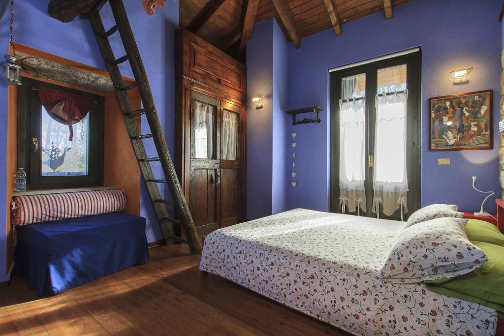 Posteľ alebo postele v izbe v ubytovaní B&B Melizio