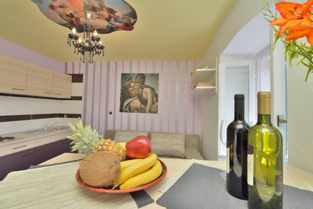 Łóżko lub łóżka w pokoju w obiekcie Apartments Carpe Diem