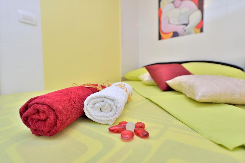 Łóżko lub łóżka w pokoju w obiekcie Apartments Carpe Diem