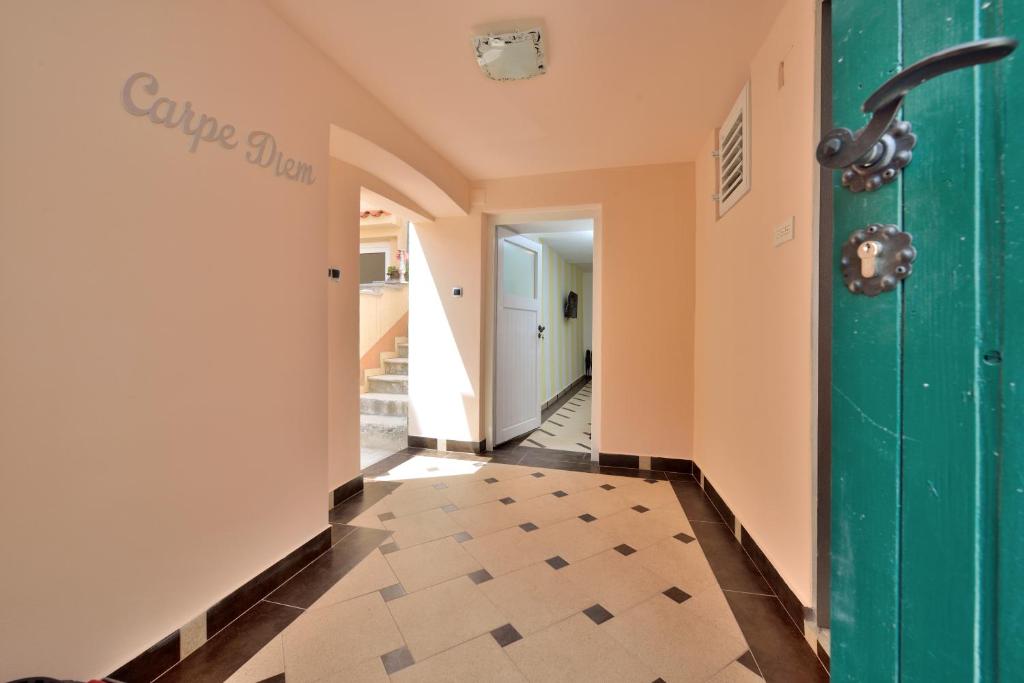 Łóżko lub łóżka w pokoju w obiekcie Apartments Carpe Diem