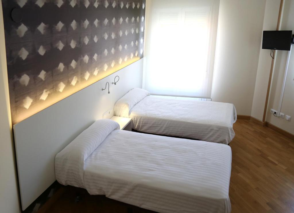 Pension los Arcos reserva habitación