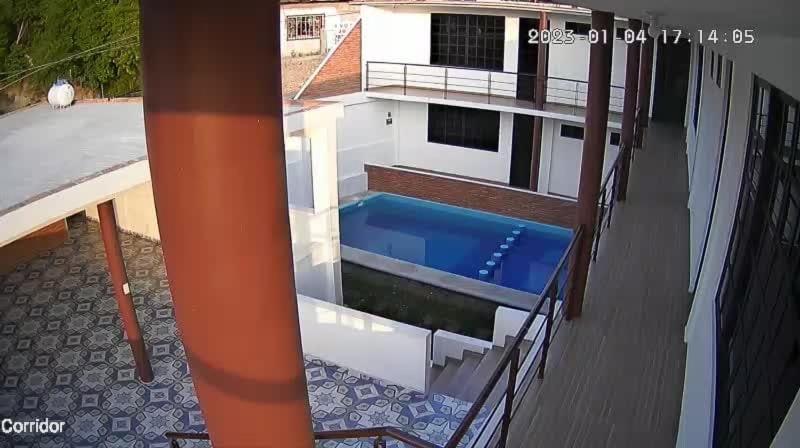 a swimming pool on the roof of a building at El Rincón Preferido in Papantla de Olarte
