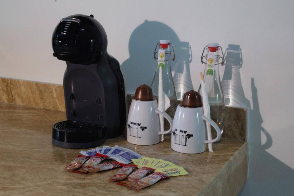 Nápoje v ubytování Hotel Alux