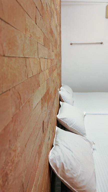 Postel nebo postele na pokoji v ubytování PPG HOMES