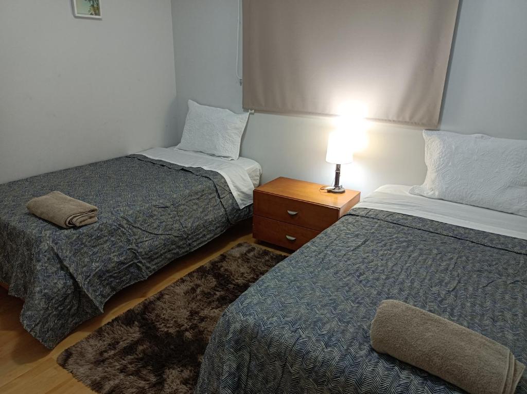 Postel nebo postele na pokoji v ubytování Miraflores View