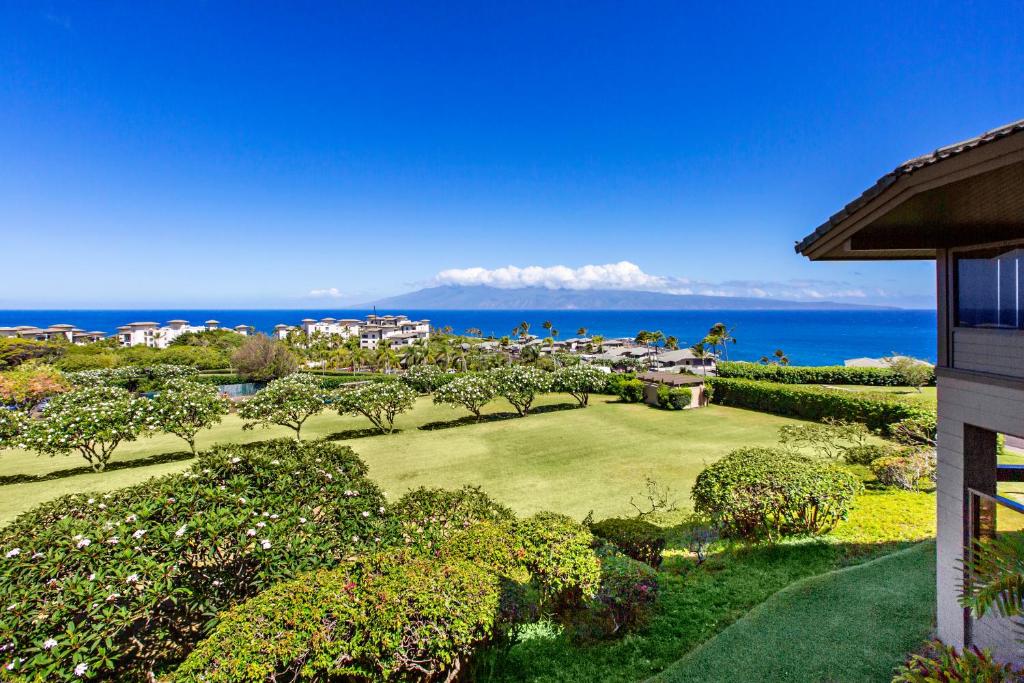 an aerial view of a resort with the ocean in the background at Kapalua Ridge Villa 2622 in Kahana