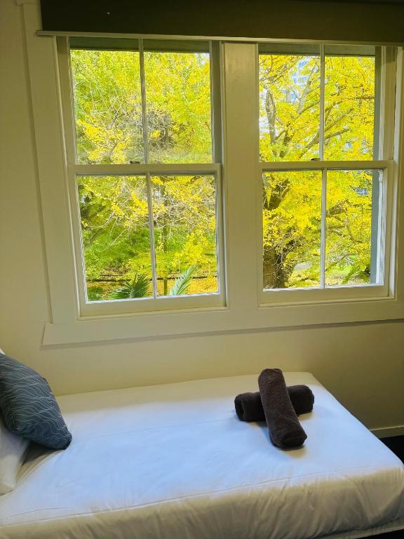 Postel nebo postele na pokoji v ubytování Gamma Hotel