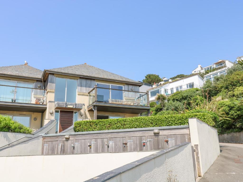 an image of a house with a fence at Rock Pool in Downderry