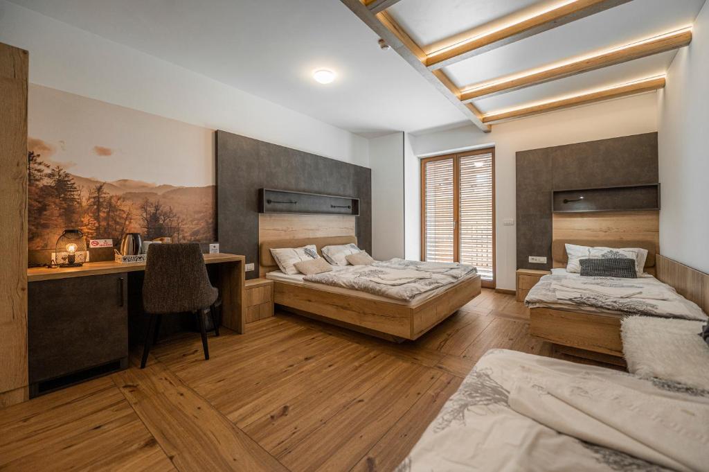 Postel nebo postele na pokoji v ubytování Veldes B&B