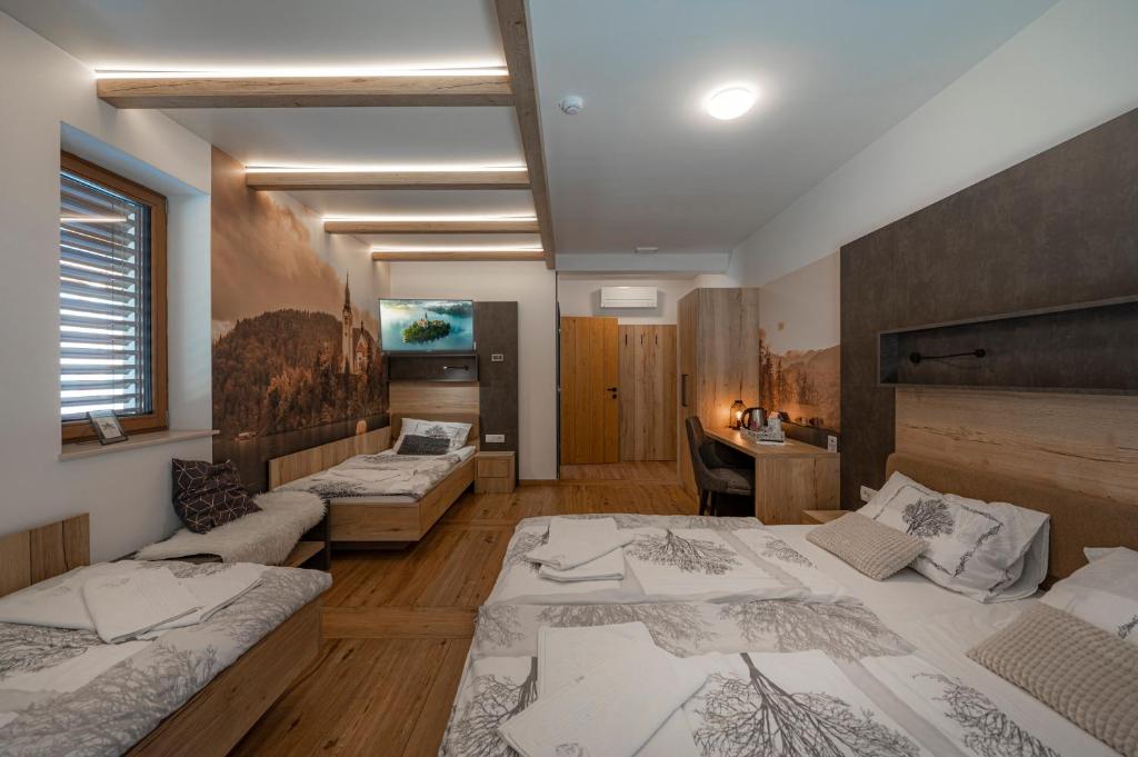 Postel nebo postele na pokoji v ubytování Veldes B&B