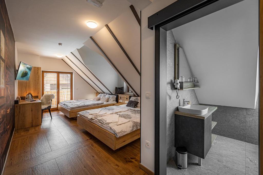 Postel nebo postele na pokoji v ubytování Veldes B&B