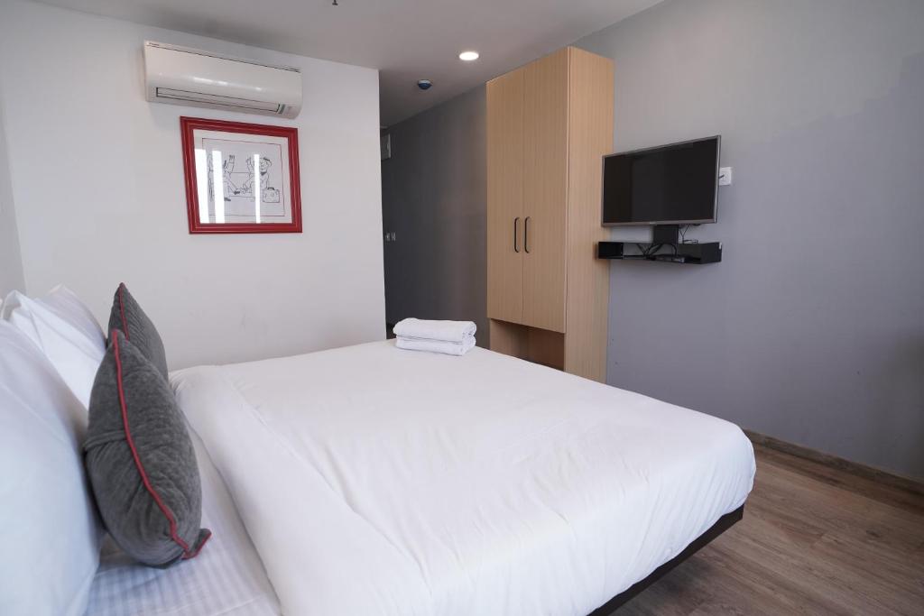 TV a/nebo společenská místnost v ubytování Hotel Sunflare