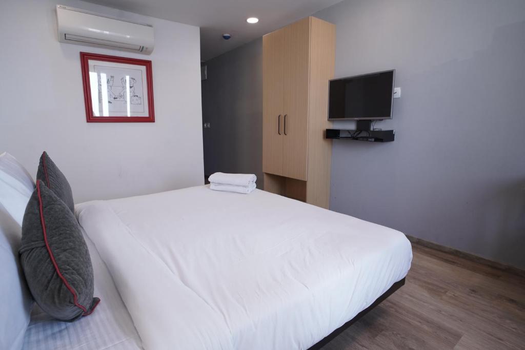 Postel nebo postele na pokoji v ubytování Hotel Sunflare