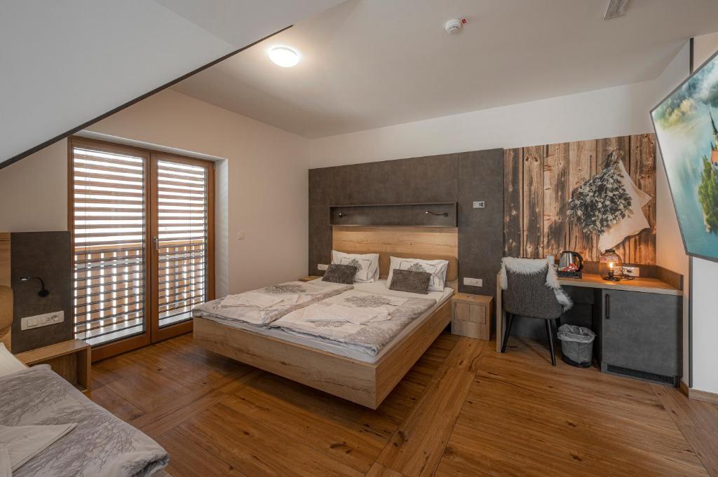 Postel nebo postele na pokoji v ubytování Veldes B&B